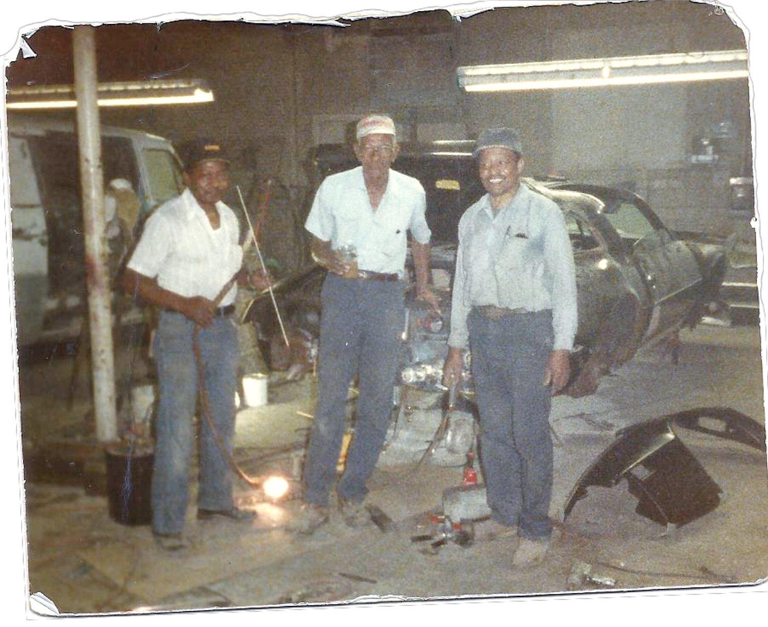 Three elderly African American auto-workers