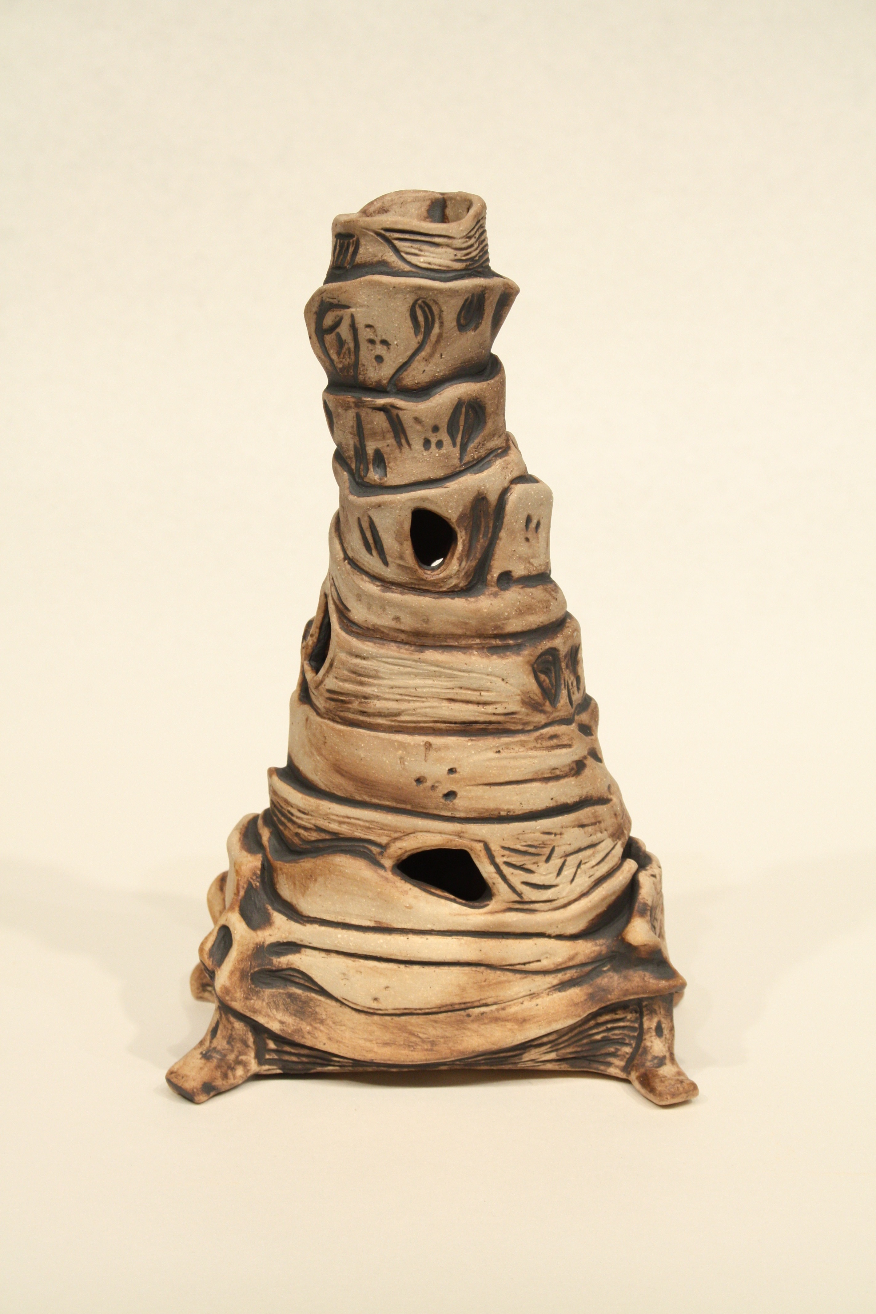Denise Widen “Tower”; sculpture of earthy tower